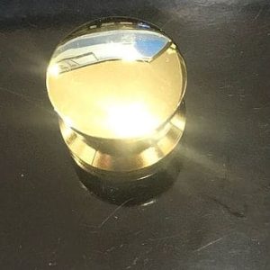 Botão grande dourado